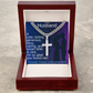 Silver-tone chain necklace with cross pendant and engraved name plate, front view