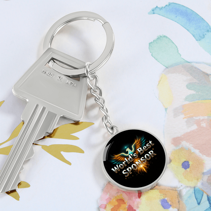 Original silver phoenix World's Best Sponsor keychain design; keys shown as styling props are not included