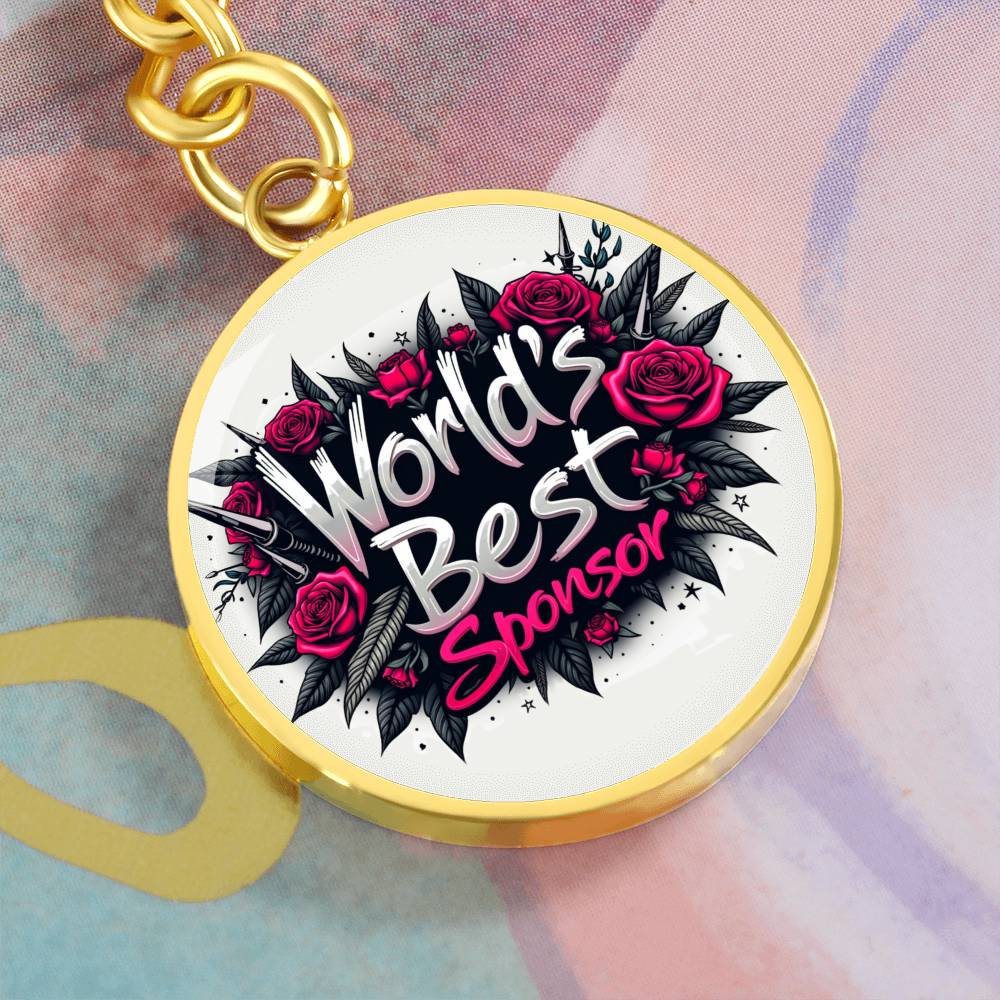 Gold round keychain with rose graphic and “World’s Best Sponsor” text front