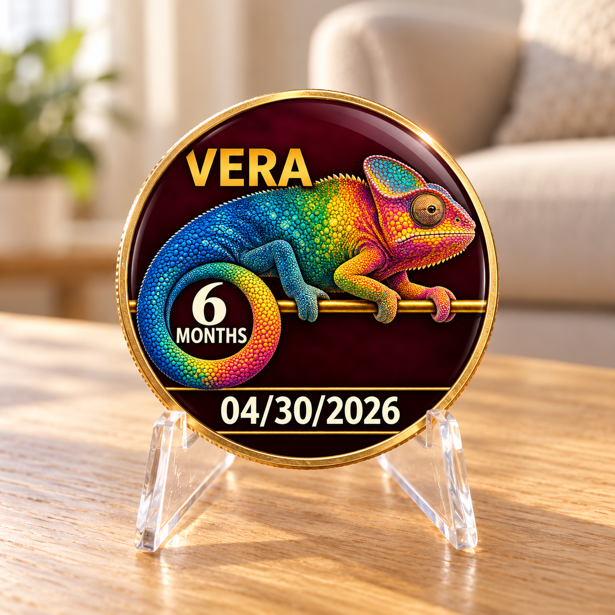 Chameleon recovery coin on a clear display stand, personalized with a name and date