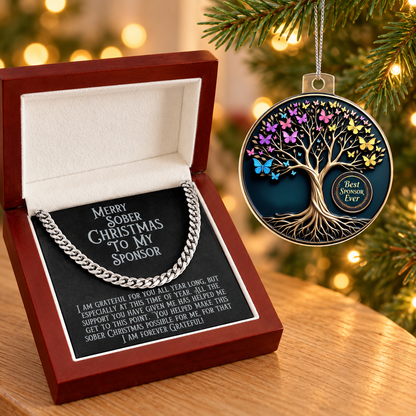 Sponsor gift set with boxed silver chain necklace and round tree ornament hanging from a branch