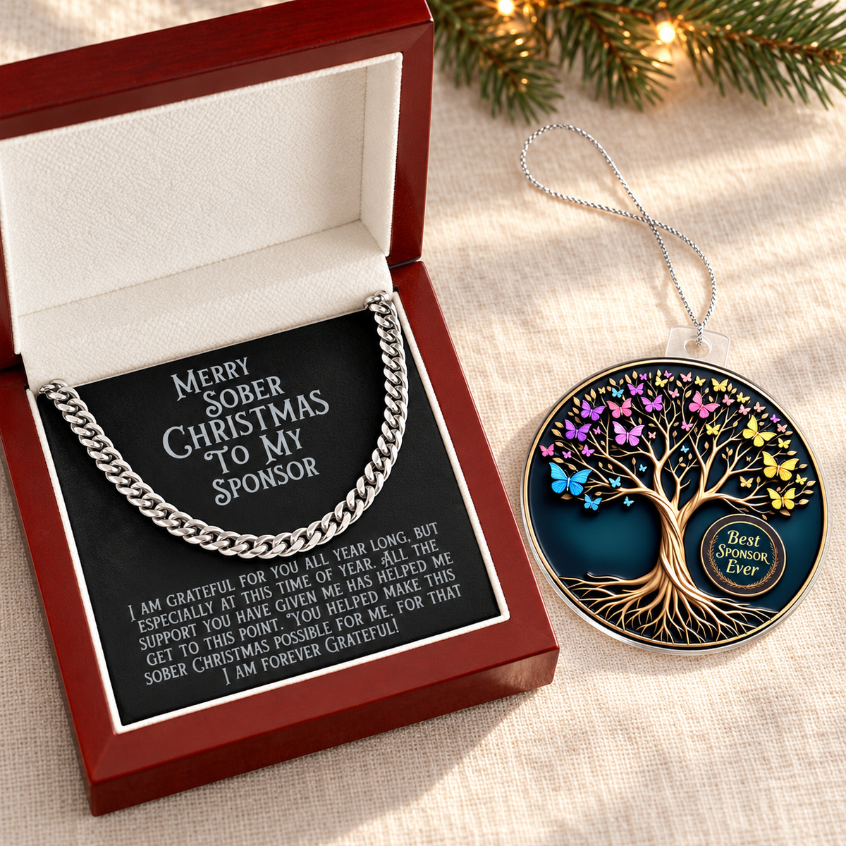 Sponsor gift set with silver chain necklace in a box and round tree ornament with colorful leaves