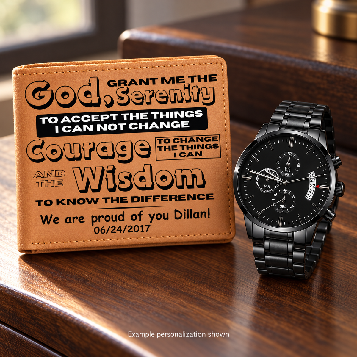 Personalized tan leather wallet beside a black metal watch