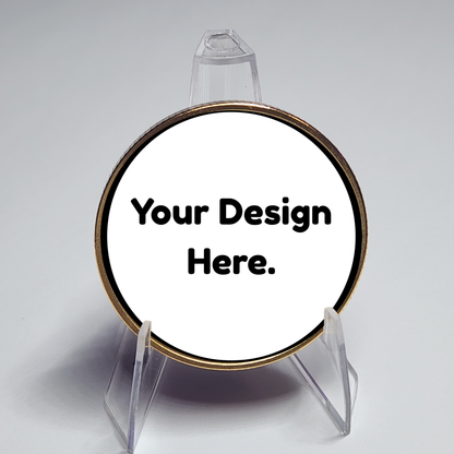 Round gold custom coin on clear stand, placeholder text "Your Design Here."