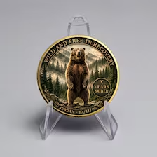 Personalized sobriety coin with bear in mountains design, gold-tone, on clear stand