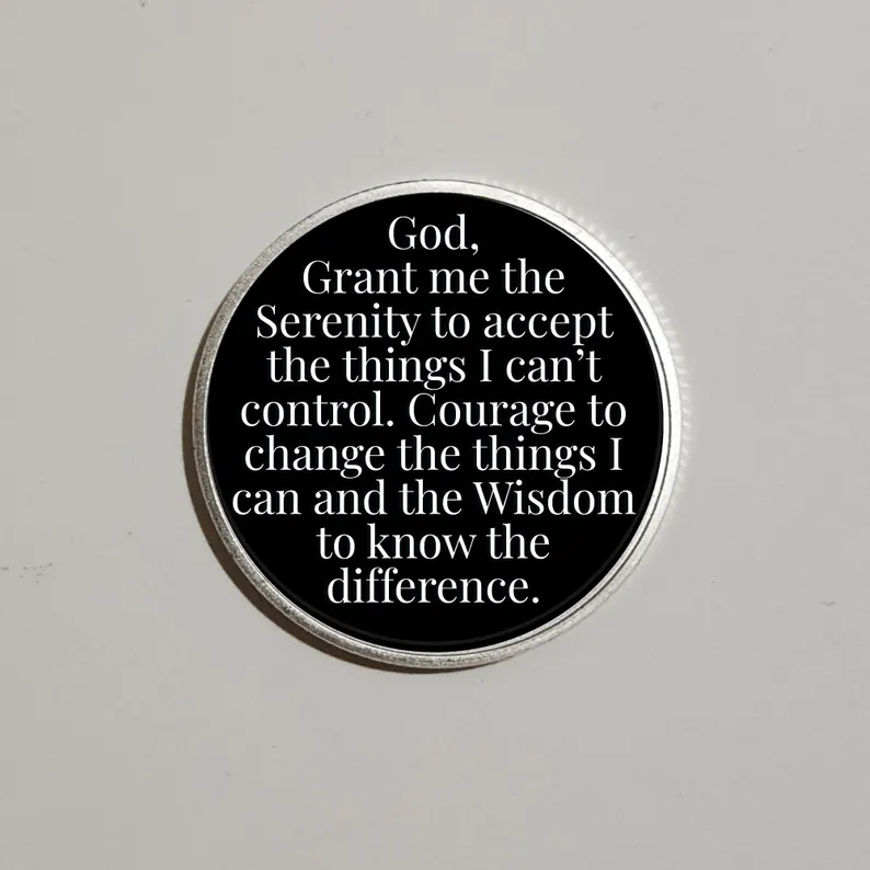 Round black custom message coin with silver rim; reads a faith prayer about serenity and wisdom.