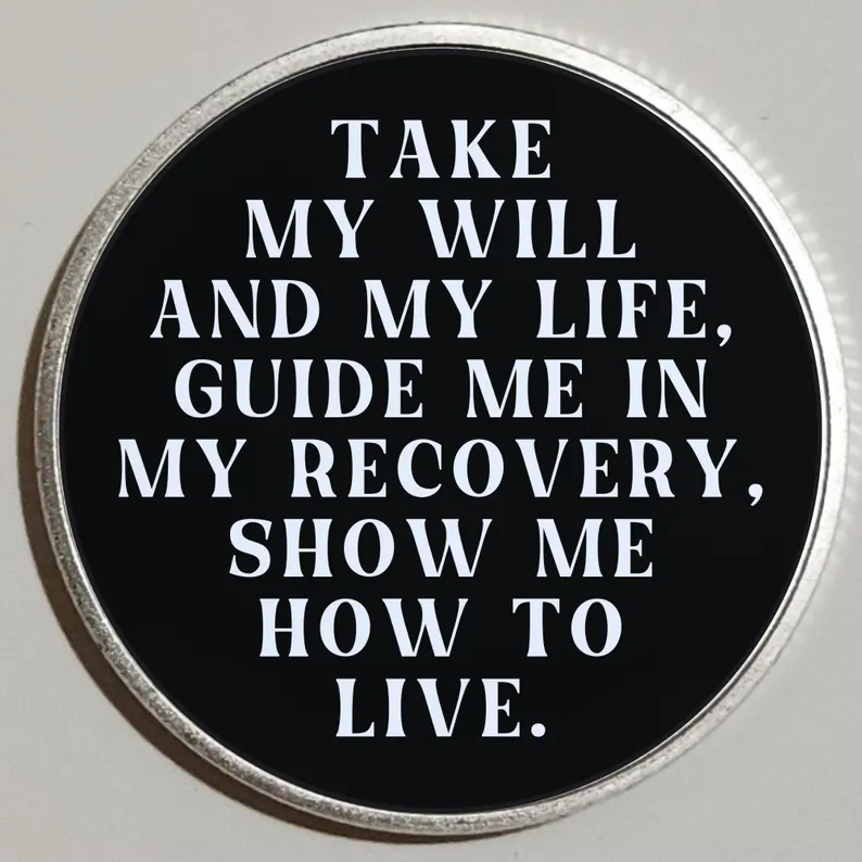 Round black custom message coin with silver rim; reads “TAKE MY WILL… SHOW ME HOW TO LIVE.”