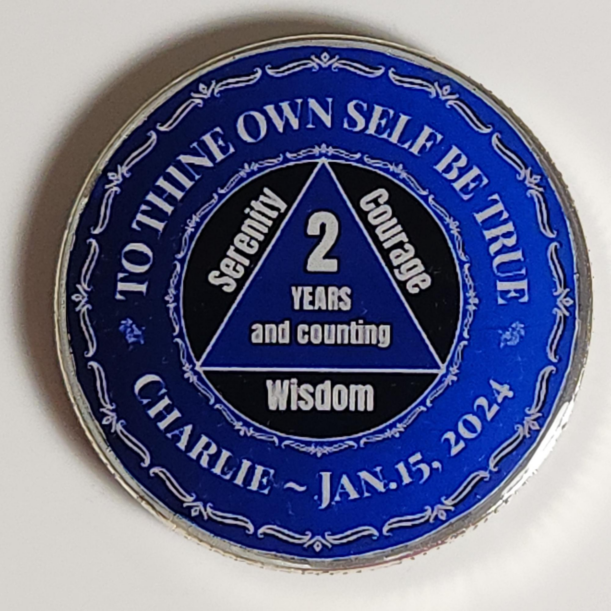 Personalized dark blue coin with triangle “2 years” and “Wisdom” inscription