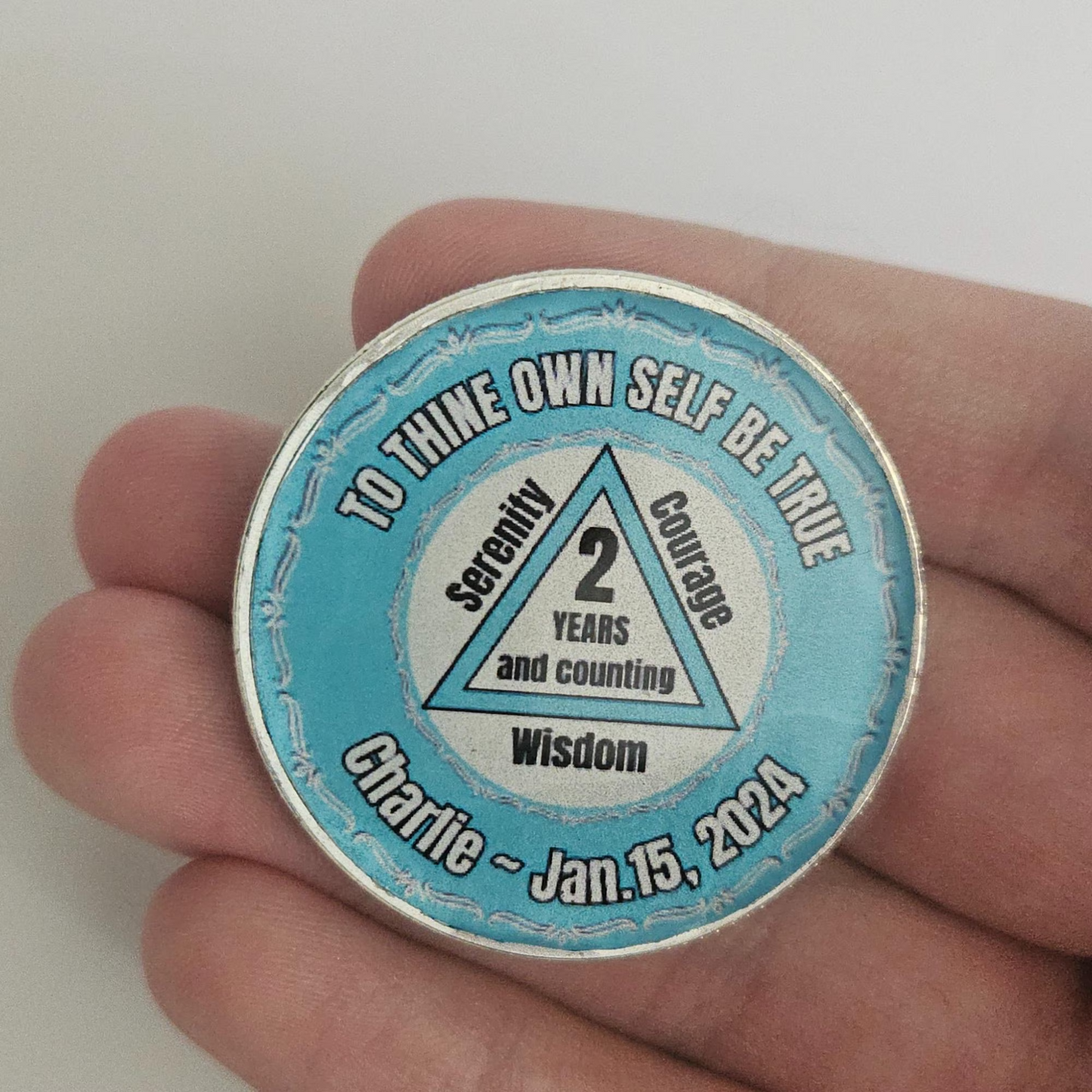 Blue personalized coin: '2 years and counting' with Wisdom and Charlie - Jan. 15, 2024