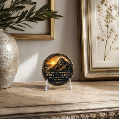 Sobriety medallion coin with mountain scripture artwork, dark gold border, on clear stand