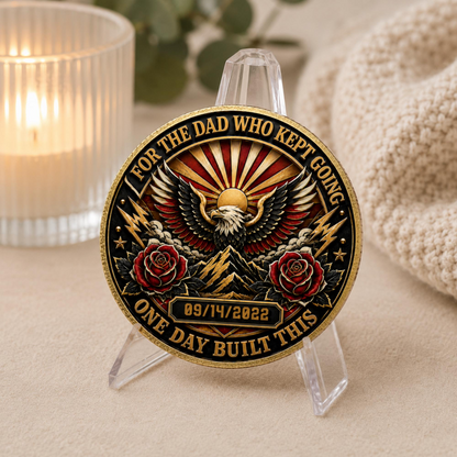 Gold recovery coin medallion on clear stand with eagle, roses, and date 09/14/2022