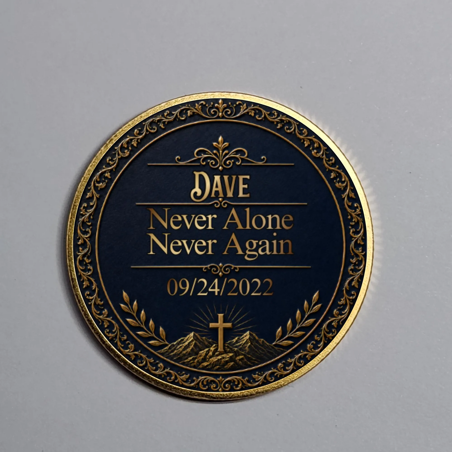 Gold-toned medallion coin with “Dave,” cross, and date text
