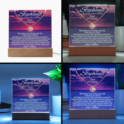 LED sobriety gift set with personalized message card and necklace pendant detail, on wooden base
