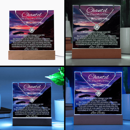 LED sobriety gift with glowing box and gold necklace pendant, shown from two angles