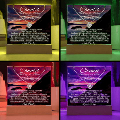 LED sobriety gift with glowing box and gold necklace pendant, multicolor lighting