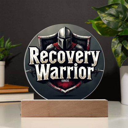 LED circular plaque with Recovery Warrior text and helmet emblem on wood base