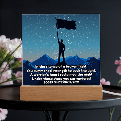 Acrylic LED star map night light on wood base with flag-bearer silhouette and mountain range