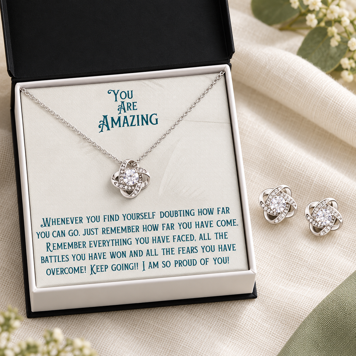 Silver-tone necklace and matching crystal stud earrings in a gift box with an encouragement card