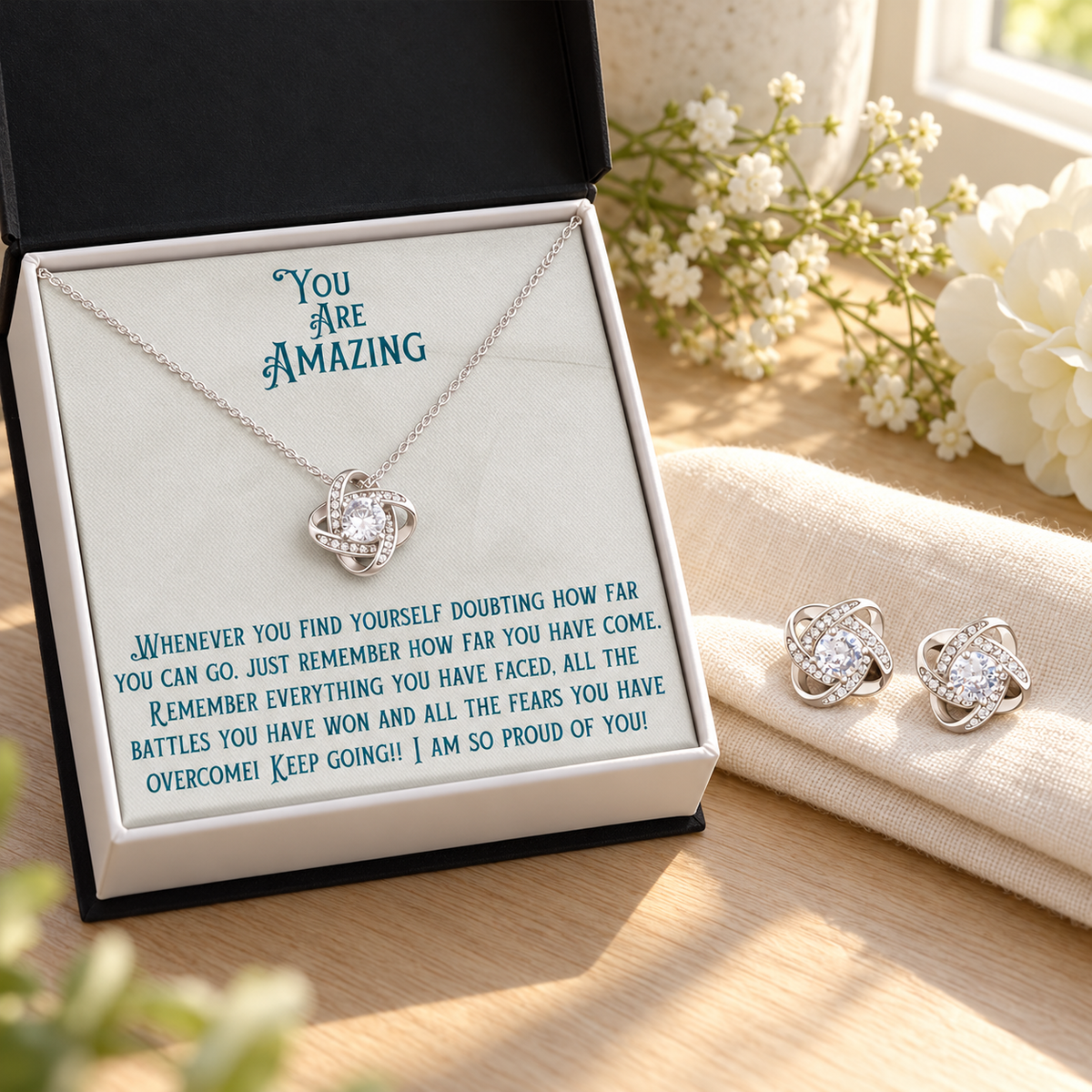 Necklace and matching crystal stud earrings displayed with an encouragement card