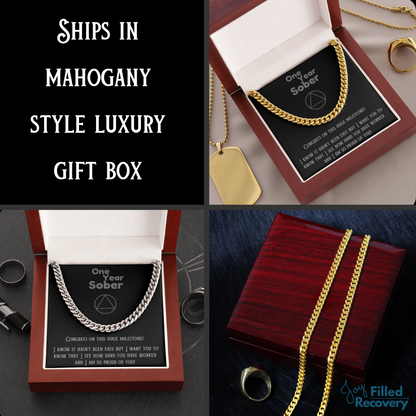 Gift box with black card and gold Cuban link chain necklace