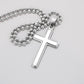 Silver ball-chain cross pendant necklace on a light background