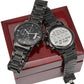 Black wristwatch with metal link band and silver engraved keepsake on gift box