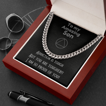 Stainless steel cuban link chain necklace draped in red gift box with message card