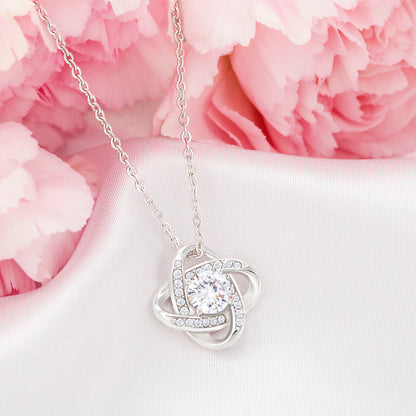 Heart pendant necklace with round clear stones on silver-tone chain